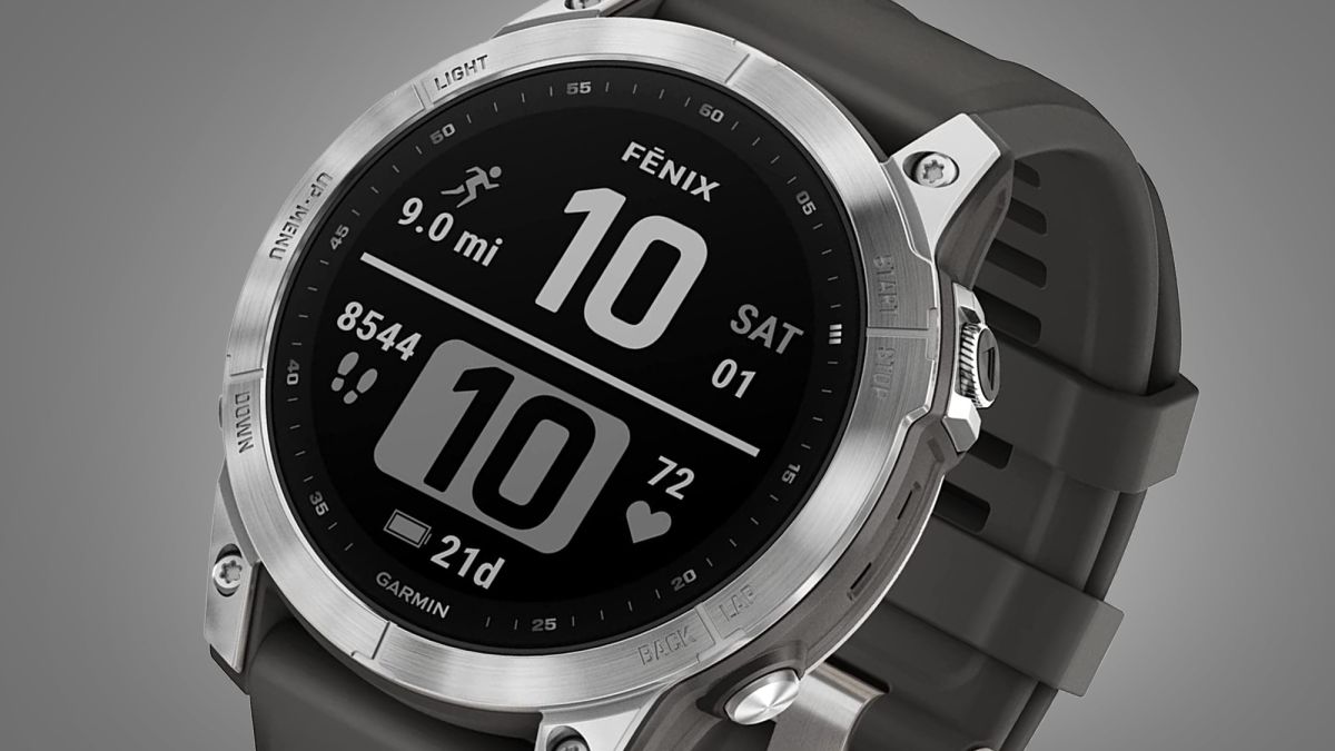 The Garmin Fenix 7 watch on a grey background