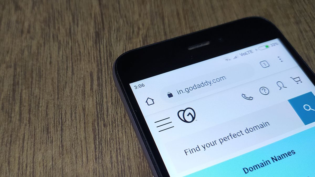 GoDaddy domains homepage on a smartphone