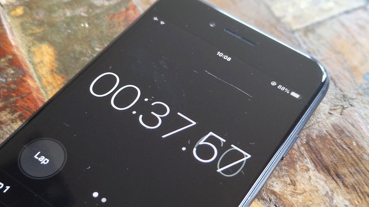 Close up of iPhone displaying the stopwatch app
