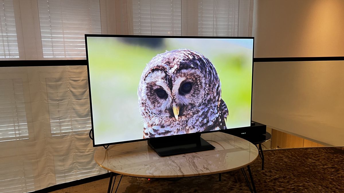 Samsung S90D 48-inch OLED TV on a wooden table